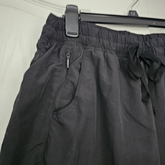 The North Face Black Running Skirt Skort Size Large Zipper Pockets Drawstring - Picture 2 of 7